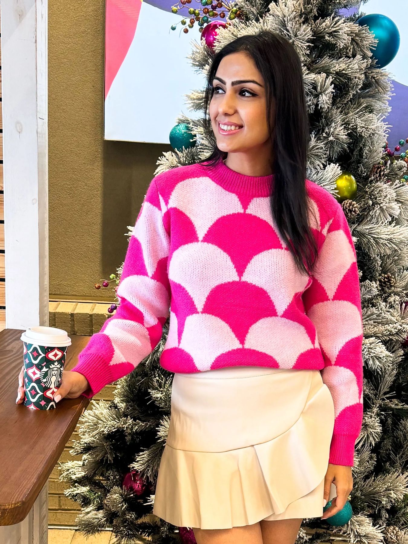 Before: the boutique's own photo of the Say Something Sweater