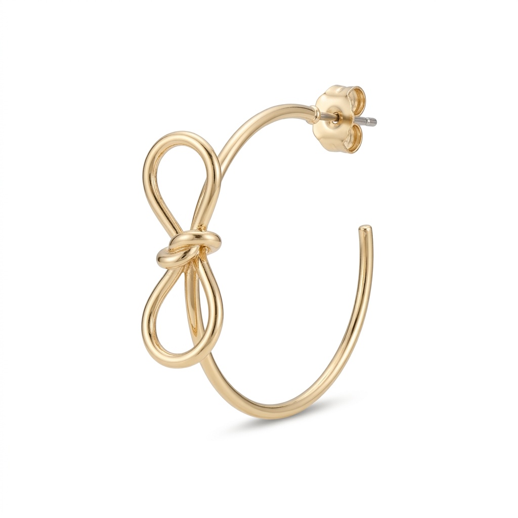 The clean cutout: gold bow hoop earrings on white, the marketplace listing shot